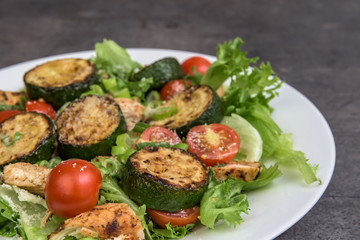 Green salad with grilled chicken and grilled courgette