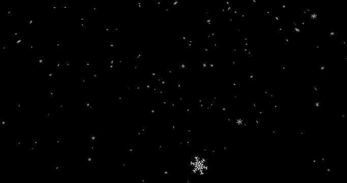 Animation of a snowfall with CG created,white and light blue snowflakes, falling from top to bottom. The first half of the footage is on a black background and the second half is on a green background
