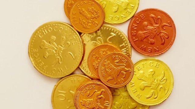 Gold penny coins in focus for business