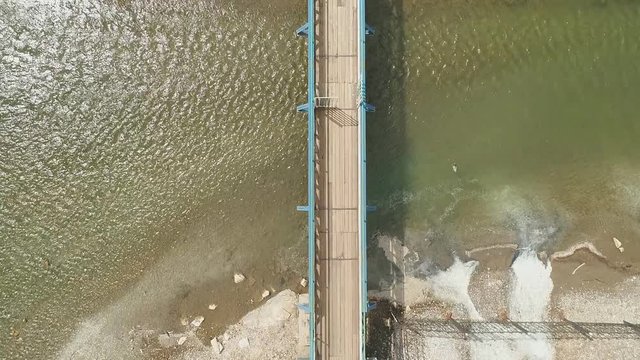 Aerial view of the wooden bridge over the river