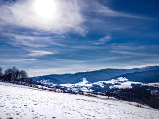 Fototapeta na wymiar View of Rytro Village and Radziejowej Range from Wola Krogulecka. Beskids Mountains in Winter.