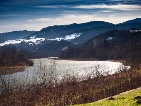 Poprad River in Winter near Barcice Village. Beskids Mountains, Poland.