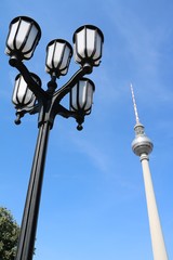 Fototapeta na wymiar Historic Lantern and Berlin TV Tower in Berlin, Germany