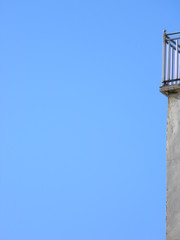 Partial view of an observation deck on top of a tall building in Tirana, Albania