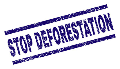 STOP DEFORESTATION seal print with distress style. Blue vector rubber print of STOP DEFORESTATION caption with dirty texture. Text title is placed between parallel lines.