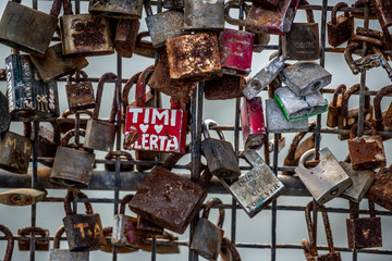 Love padlocks on a bridge fence