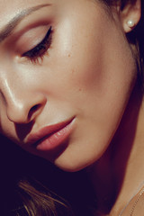 Beautiful Face of Young Woman with Clean Fresh Skin close up. Beauty Portrait. Youth and Skin Care Concept - Image