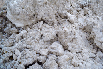 Background gray white snow drifts. Nature texture.