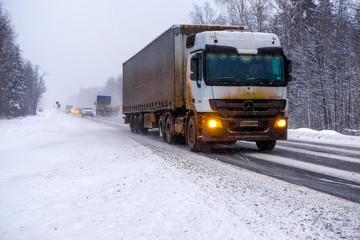 Moscow Region, Serpuchov, Russia - December, 24, 2018: image of a truck on a winter road