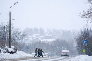 Russia, Zaraysk - January, 4, 2019: the image of cars on the road in the city of Zaraysk during the snowfall