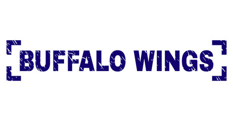 BUFFALO WINGS tag seal print with distress texture. Text tag is placed inside corners. Blue vector rubber print of BUFFALO WINGS with scratched texture.