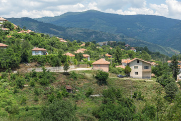 Fototapeta na wymiar Panorama with village of Gega and Ograzhden Mountain, Blagoevgrad Region, Bulgaria