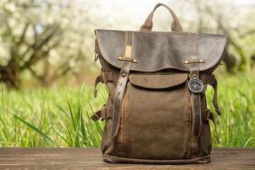 Vintage backpack on a natural background