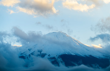 Fototapeta na wymiar Fuji mountain with snow cover on the top,