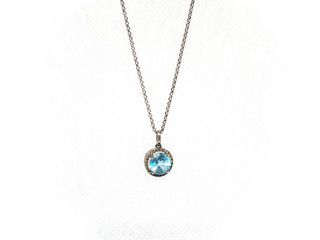 White gold chain with blue stone