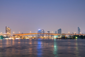 Fototapeta na wymiar Bridge over river in Bangkok city.