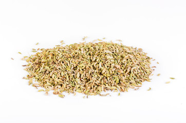 Pile of fennel seeds on white background