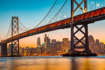 Deurstickers San Francisco skyline met Oakland Bay Bridge bij zonsondergang, Californië, USA © JFL Photography