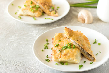 Béchamel baked pancakes stuffed with mushrooms