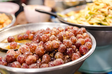 fresh grape coat with sugas and salf, it is some ingredients of mango salad