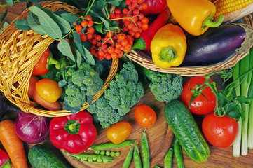Various appetizing vegetables on the kitchen board. Close-up. 