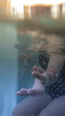 Fototapeta na wymiar hands in water