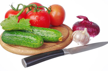 Various appetizing vegetables on the kitchen board. Close-up. 