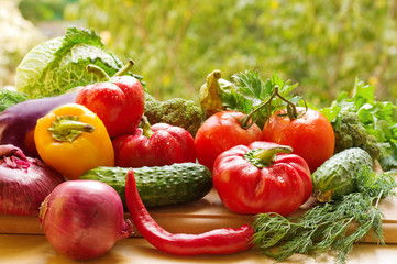 Various appetizing vegetables on the kitchen board. Close-up. 