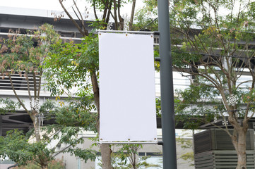 Large blank billboard on a street wall, banners with room to add your own text