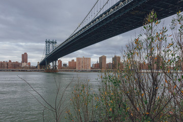 Manhattan skyline viewed from Brooklyn with Manhattan bridge, in New York City, USA