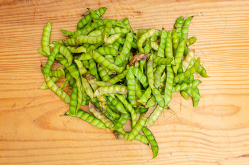 Pigeon Peas Pods On Board Surface