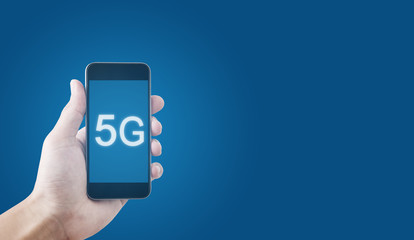 5G technology, Hand using 5g internet on mobile smartphone and on blue background