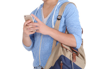 Close up view of man with backpack and smartphone