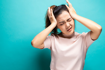 Woman suffering from head ache