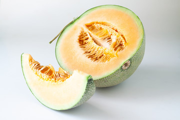 Half and slice Japanese melons or orange melons. Healthy fruit
