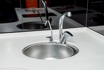 The photo of a sink in a bathroom