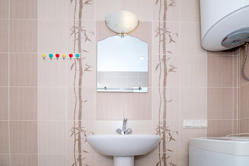 The photo of a sink in a bathroom