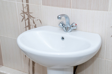 The photo of a sink in a bathroom