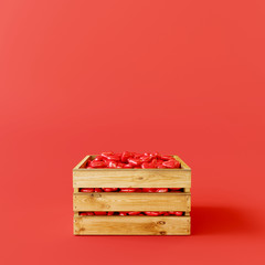 Hearts in the crate on red background. Valentine concept. 3d rendering