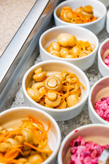 catering table with salads