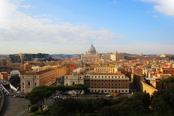 Fototapeta na wymiar Rome, Italy - December 30, 2018: Panorama of Rome and view at St. Peter's Basilica (Vatican) from Angel Castle (Castel Sant'Angelo).