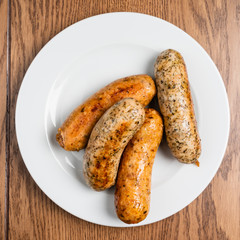sausages on the white plate