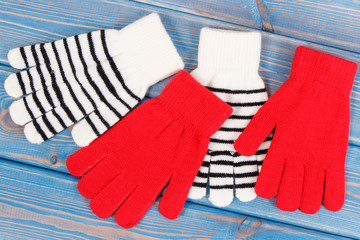 Red with black and white gloves for woman made of cotton or wool, clothing for autumn or winter