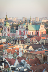 Fototapeta na wymiar Poznan, Poland - October 12, 2018: View on buildings and collegiate church in polish town Poznan