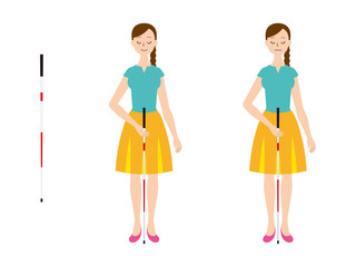 白杖を持つ視覚障害者の女性