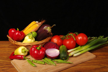 A variety of delicious vegetables on the kitchen board. Copy space. 