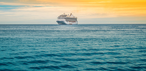 Cruise ship on the ocean. Travel background.