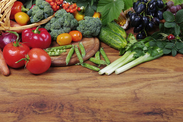 A variety of delicious vegetables on the kitchen board. Copy space. 
