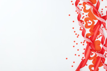 Background wit red ribbon and bright hearts for Valentine day decoration