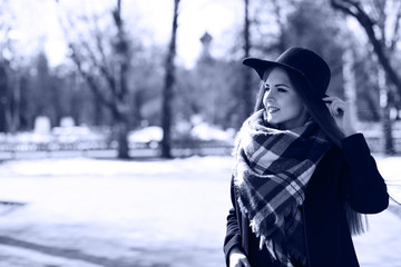 Black and white photo of a young girl on a walk